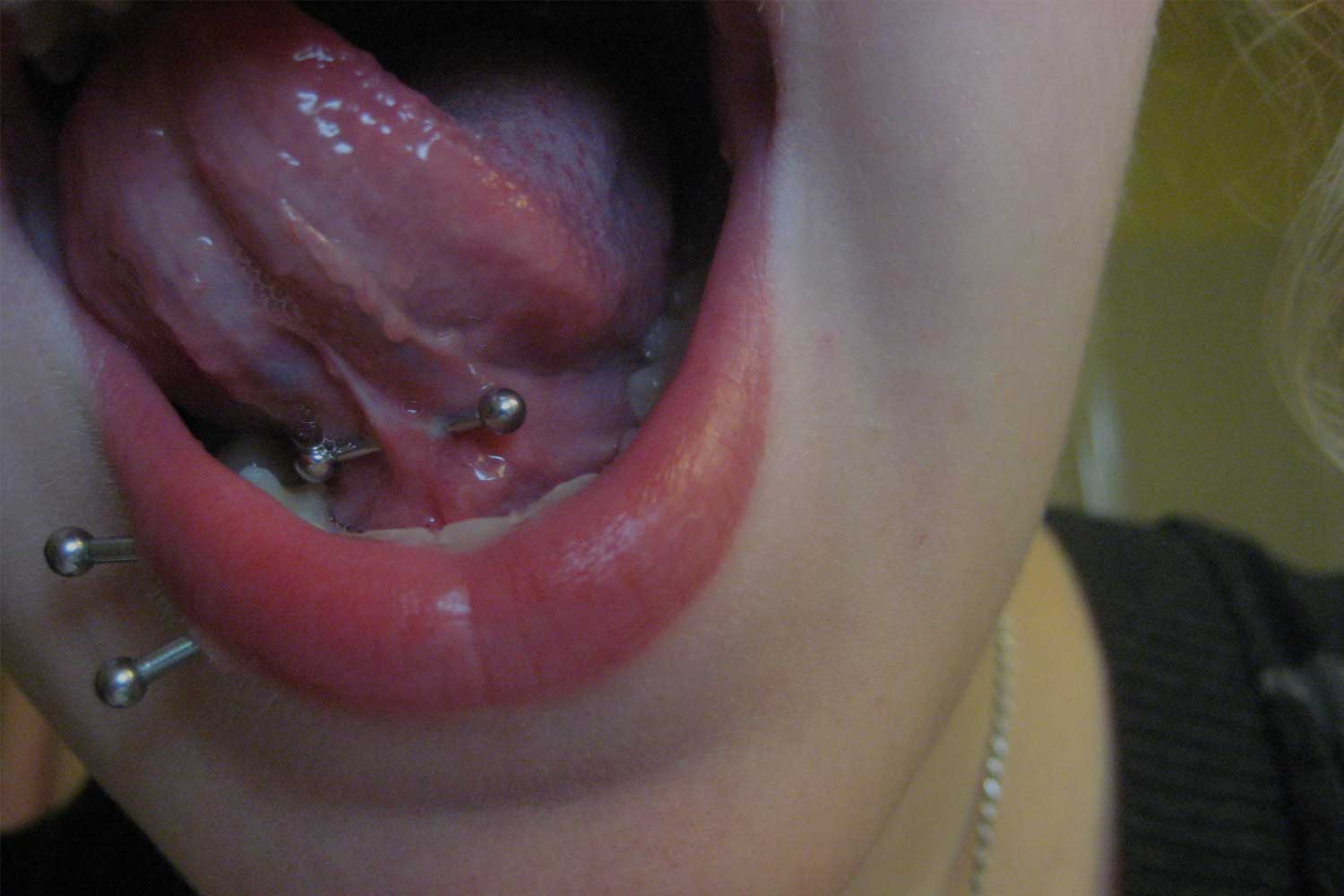 tongue web piercing pros and cons