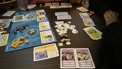 Group of friends playing a strategy card game called Civilizations