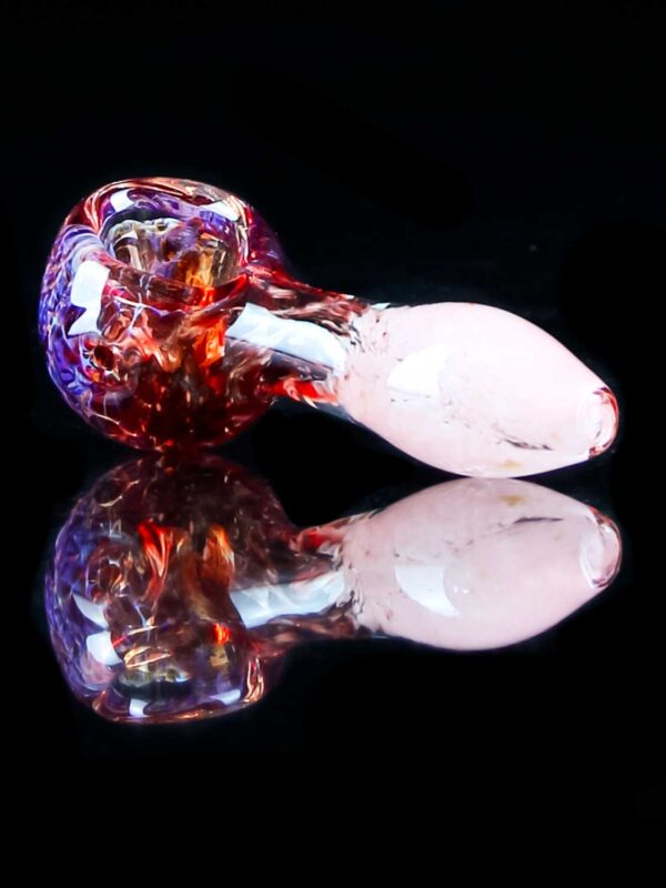 red glass pipe with pink mouthpiece