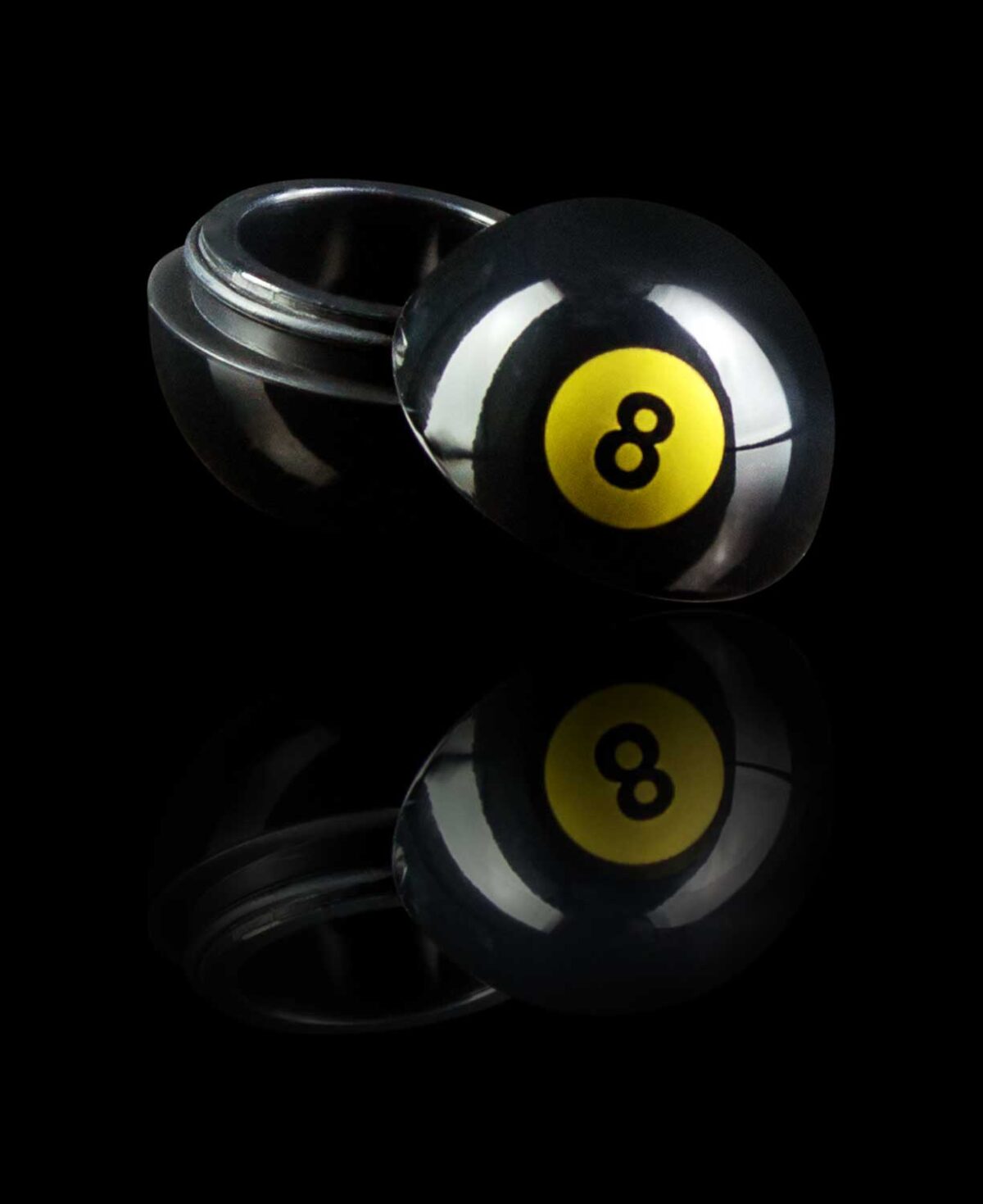 8 ball silicone dab container on black table