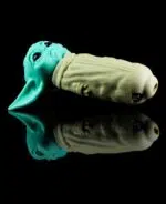 baby yoda pipe made from food grade silicone on black table