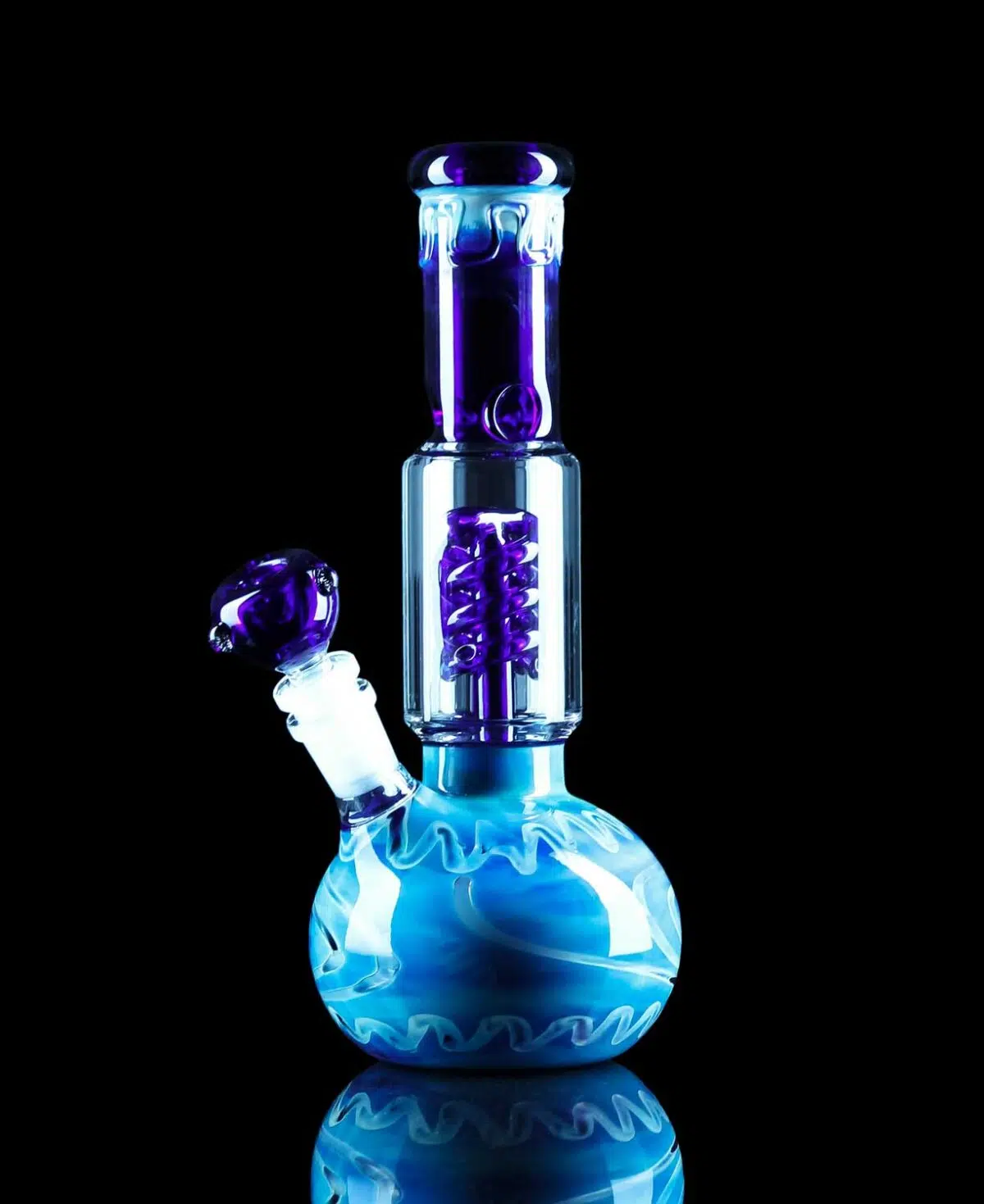 blue glass bong with ice catcher and matching blue bong bowl