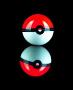 pokeball dab container on table with reflection