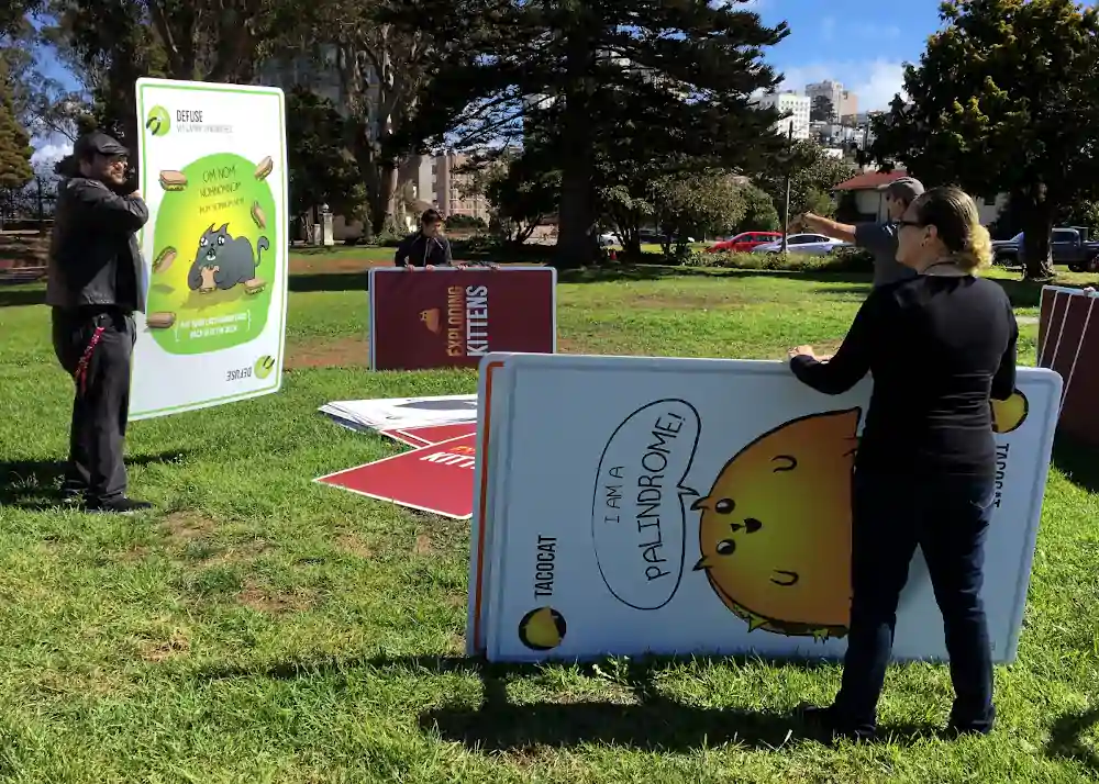Fans play a life-sized version of the card game Exploding Kittens