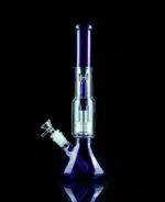 matrix perc bong with clear and blue glass wrap on black table