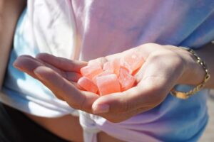 hand holding gummy edibles