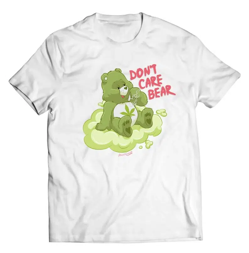 A white t-shirt featuring a stoner bear that "don't care"