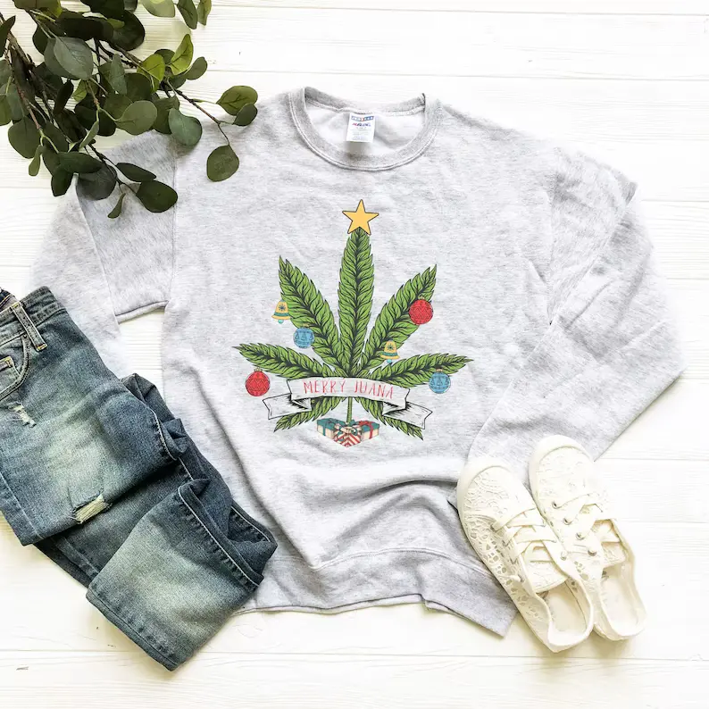 A white t-shirt that says "Merry Juana"