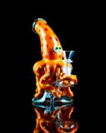 cute bong shaped like a squid with tentacle wrapped around bowl