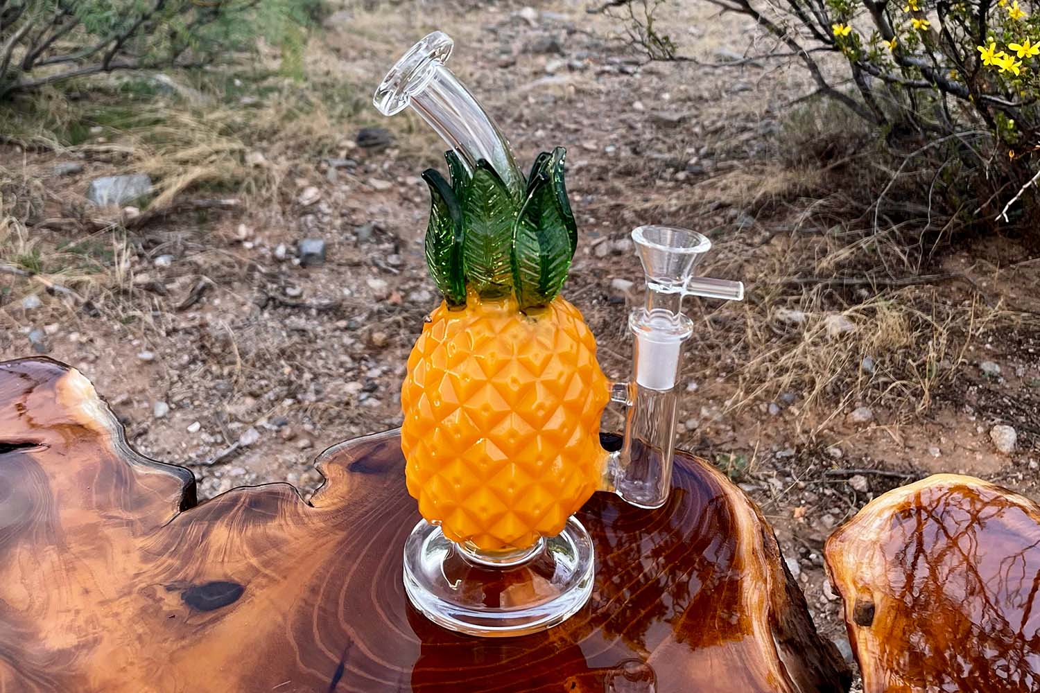 cute pineapple bong on wooden table