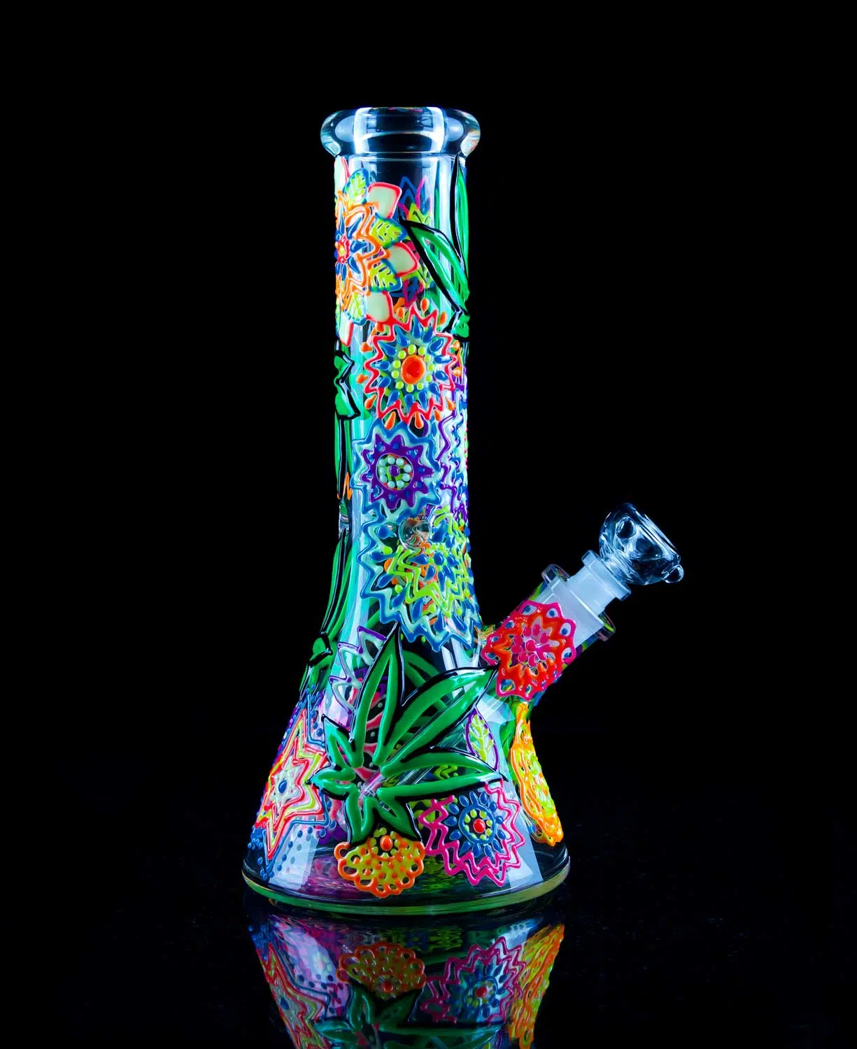 flower bong with hand painted design that glows in the dark