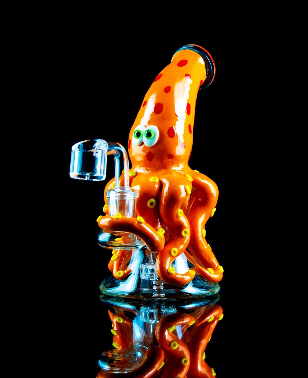 mini dab rig shaped like a squid with tentacles wrapped around banger