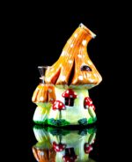mushroom shaped bong house with polka dots and glass bowl