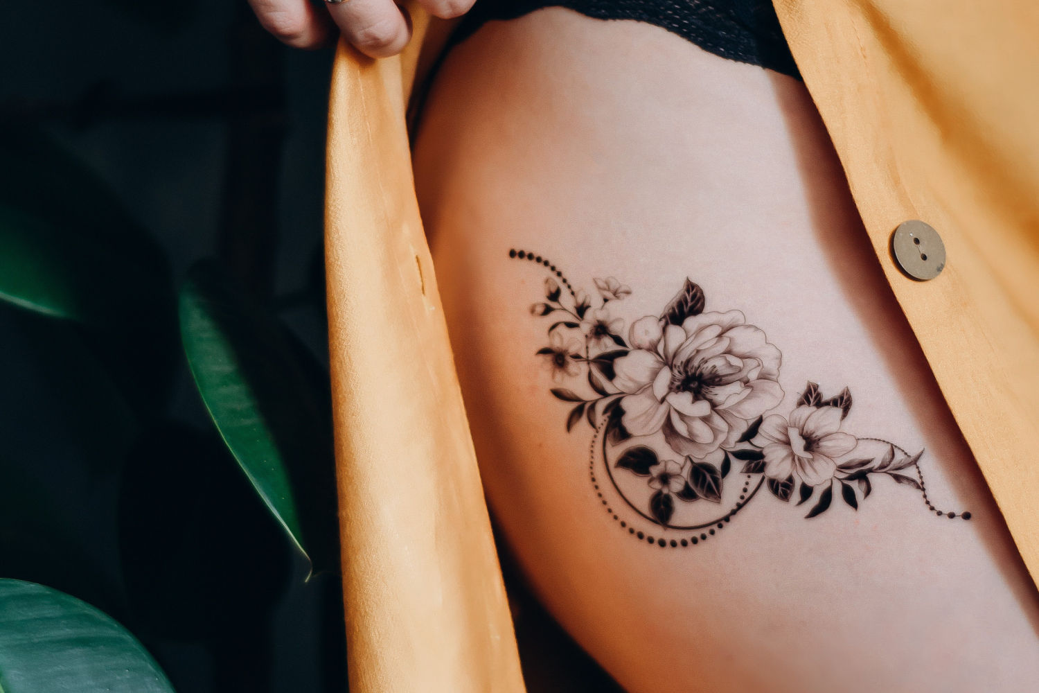 Floral hip tattoo