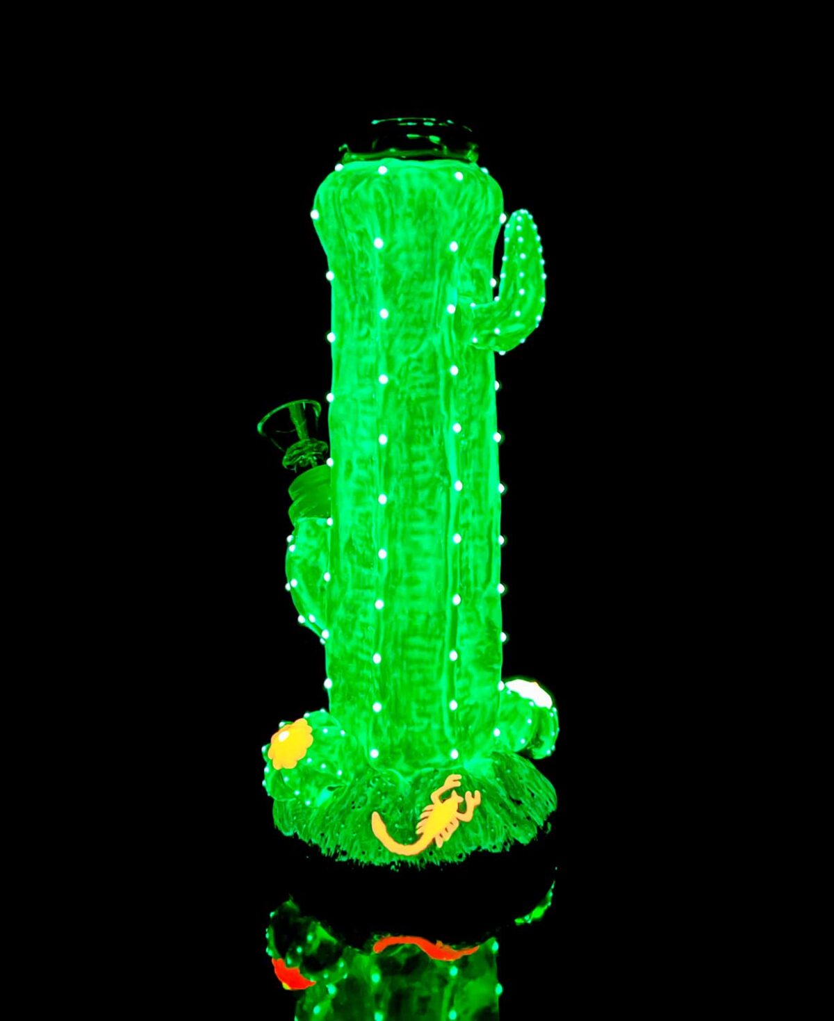 cactus bong with hand painted design glowing in the dark