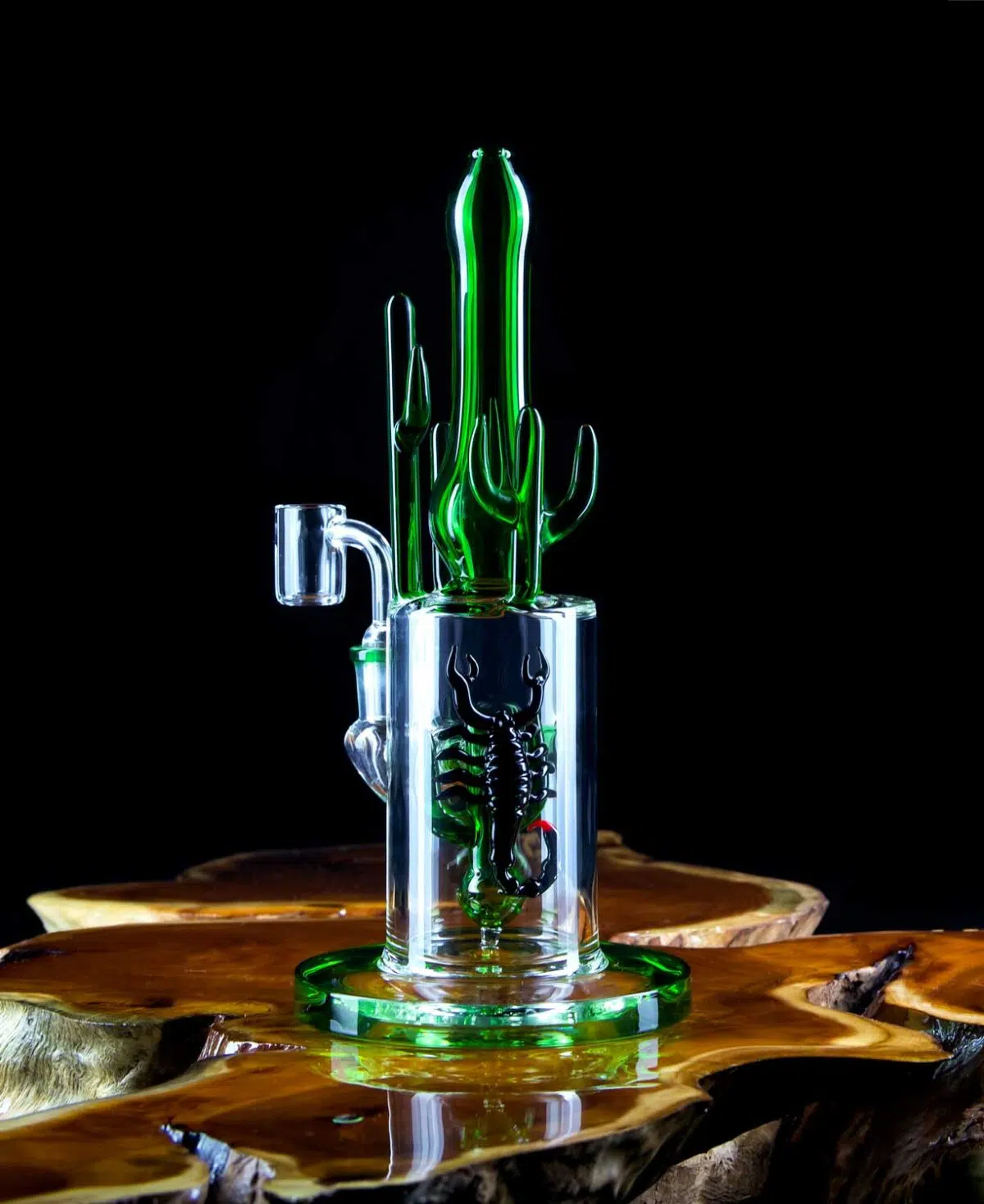 cactus dab rig with scorpion perc on wooden table