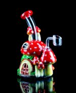 mushroom rig made from glass and clay shaped into a cottage with mushroom caps