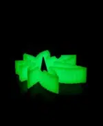 silicone debowler ashtray in the shape of a weed leaf glowing in the dark
