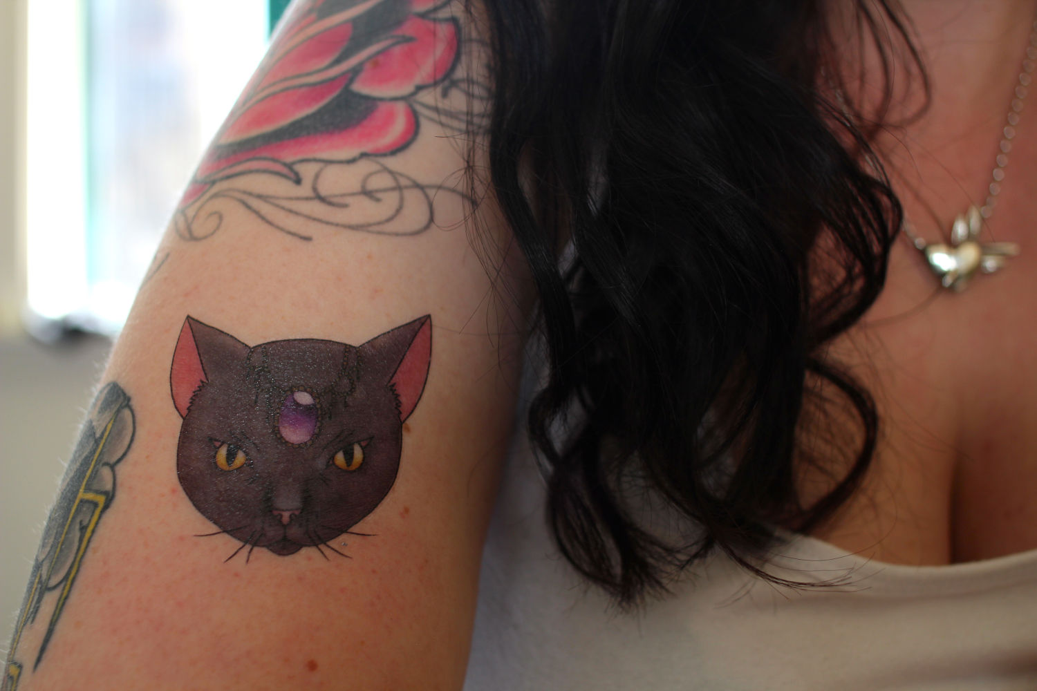 Neo-traditional cat tattoo