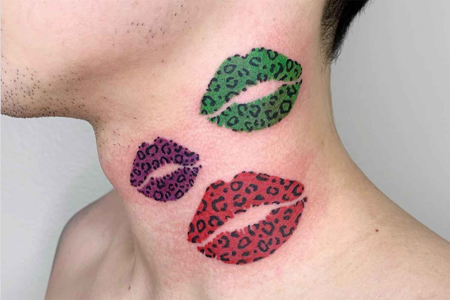 cheetah print lips tattoo on neck