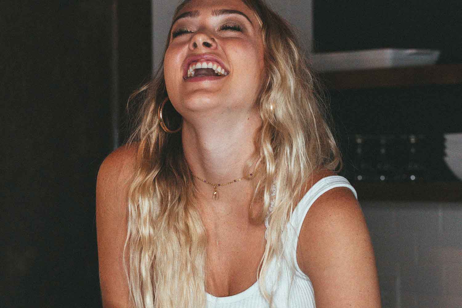 girl laughing high