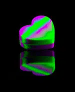 dab container shaped like heart with pink and green tie-dye pattern