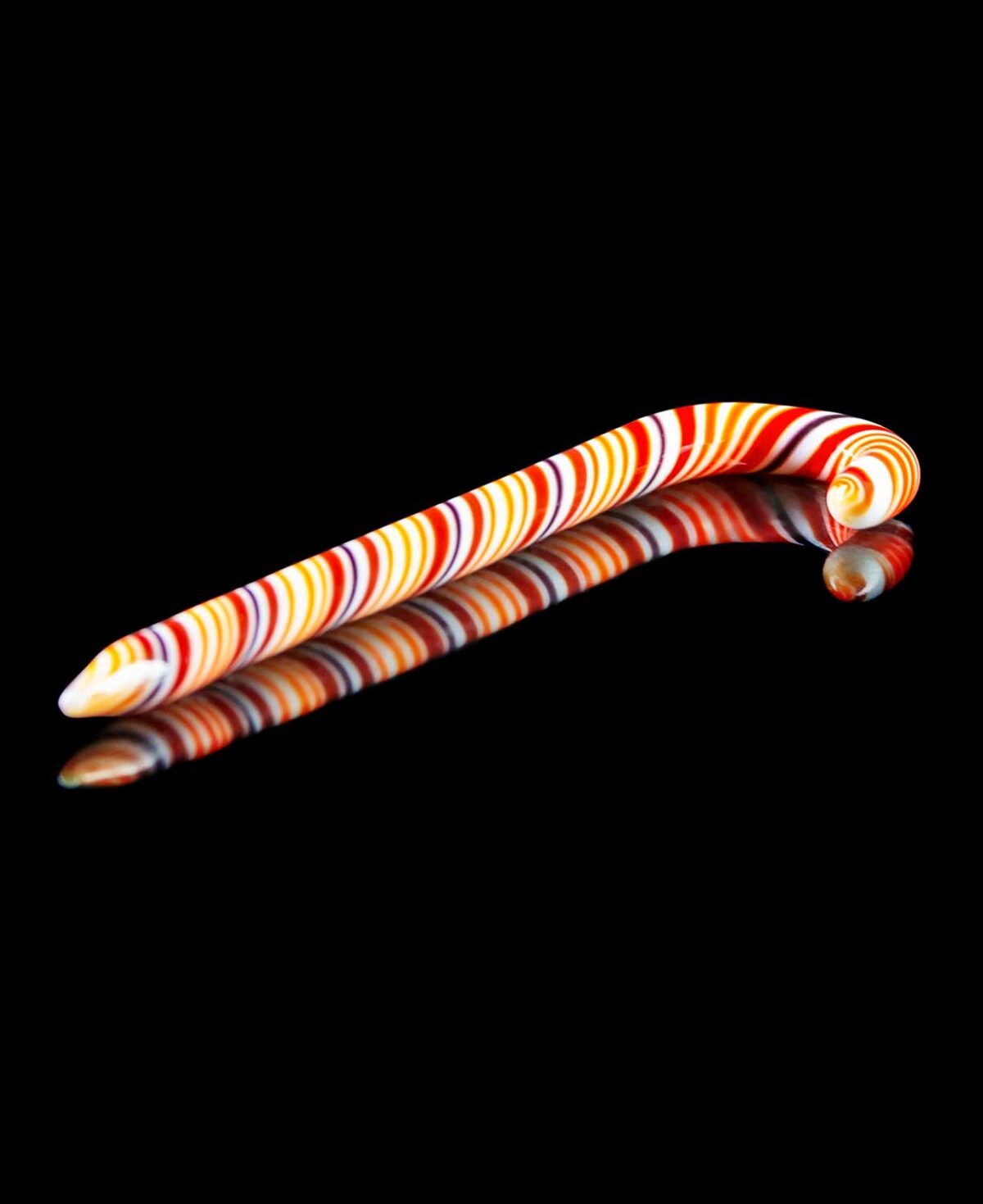 glass dab tool shaped like a candy cane