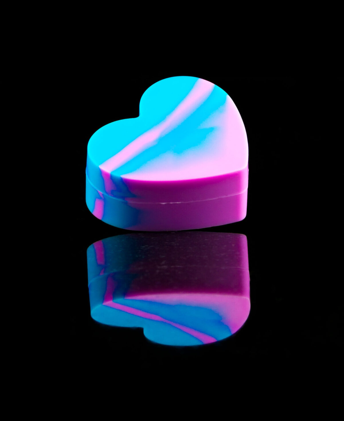 silicone dab container shaped like a heart in blue and pink tie-dye