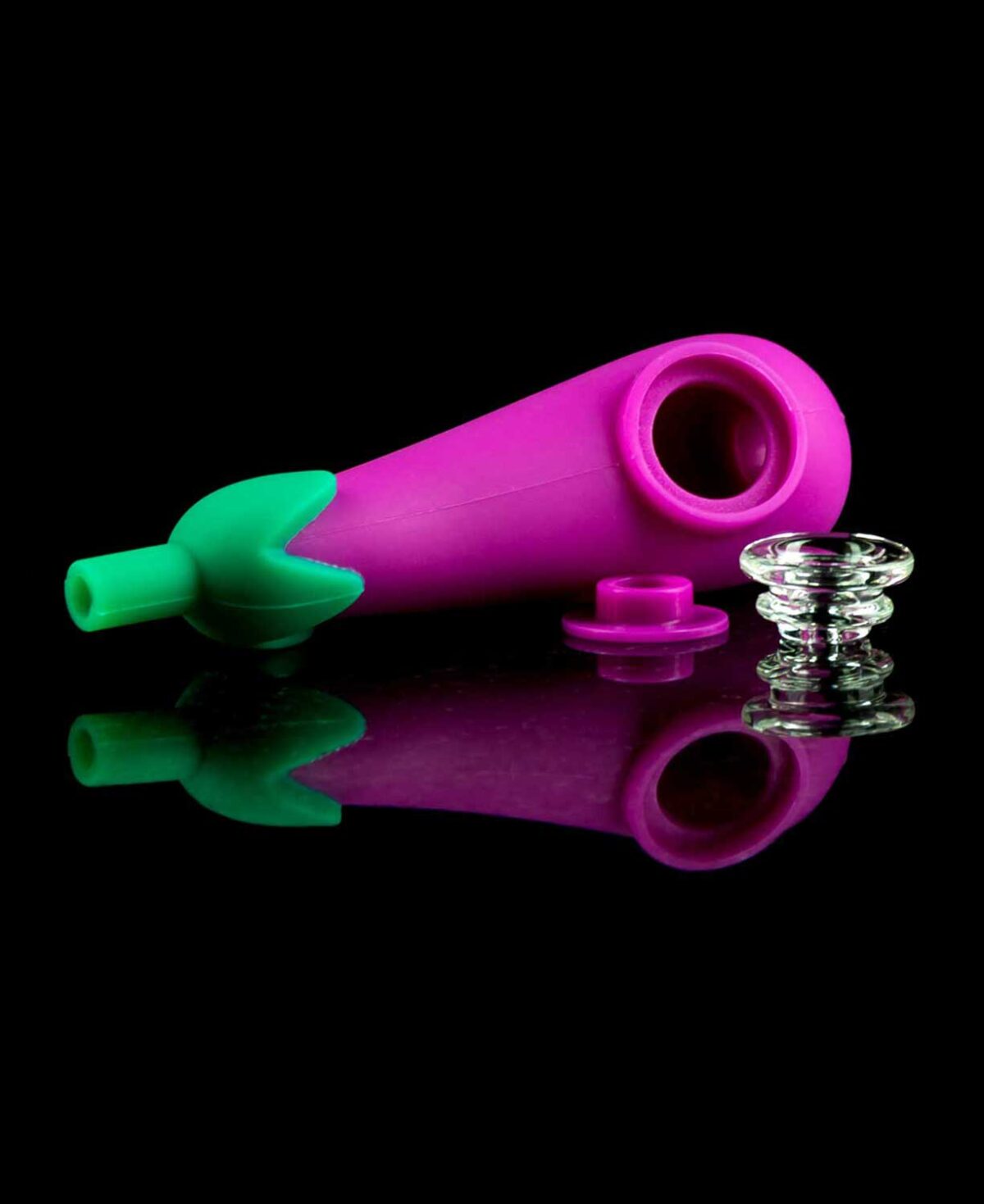 silicone eggplant pipe with glass bowl on black table