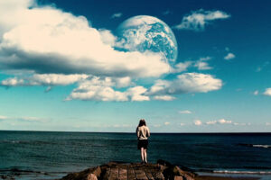 man standing in front of another earth