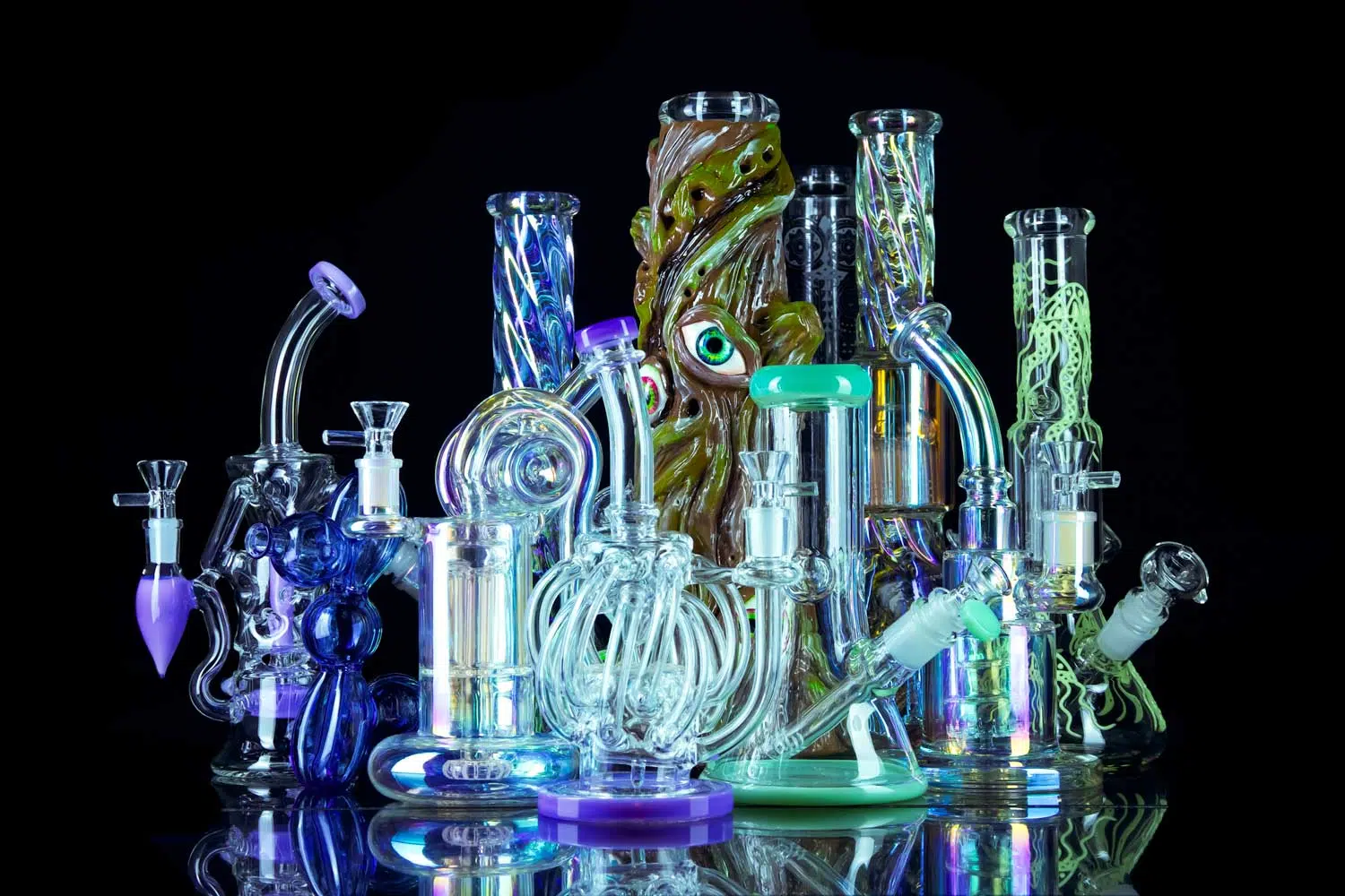 Glass bongs for sale on black table