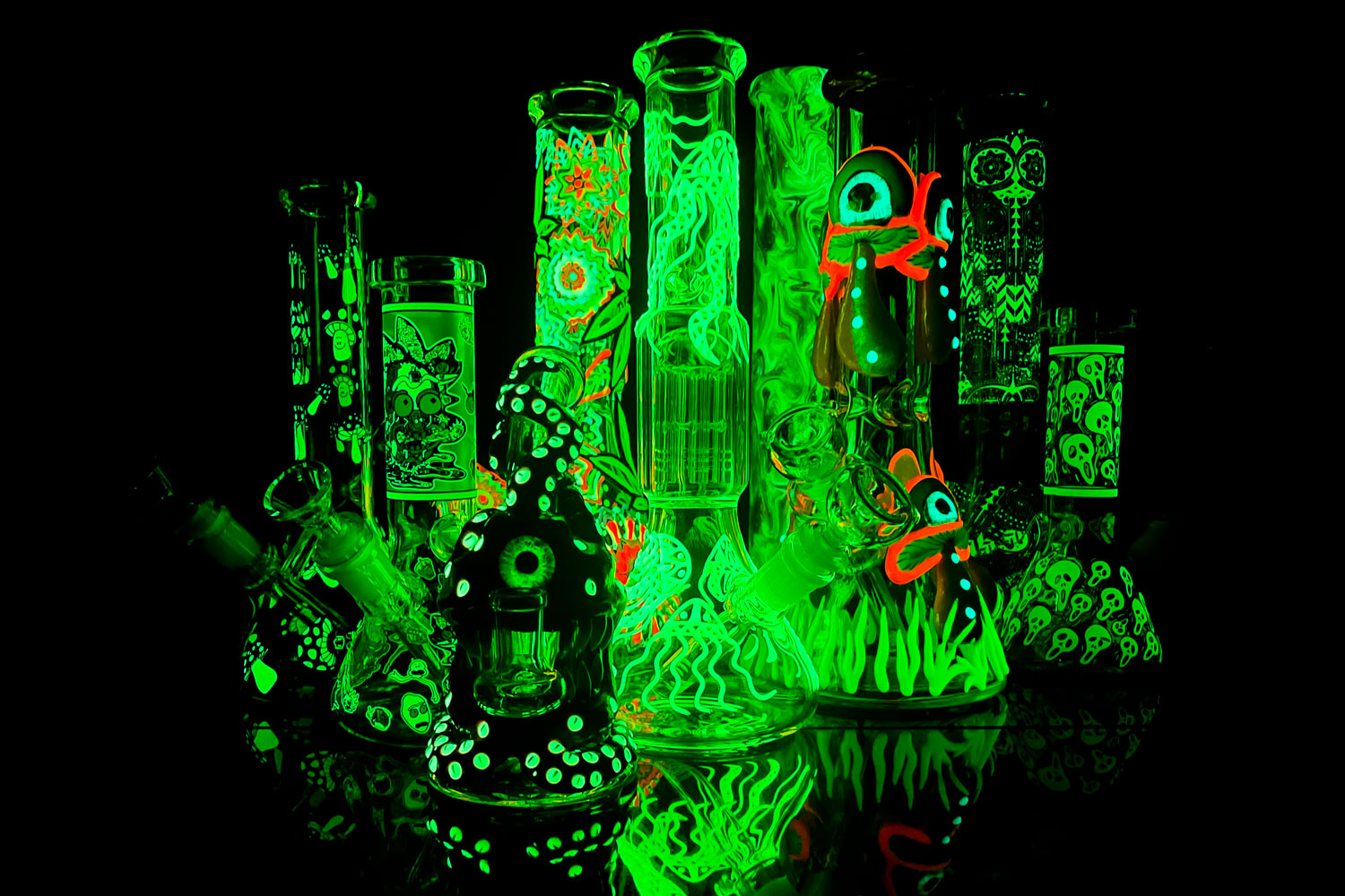 glow in the dark bongs for sale on black table
