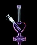 heart shaped bong made from borosilicate glass on black table