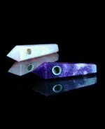 gemstone pipes on black table