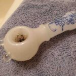 white girly flower pipe with blue flower design