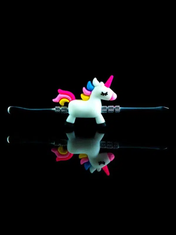 unicorn dab tool made from metal with food grade silicone charm