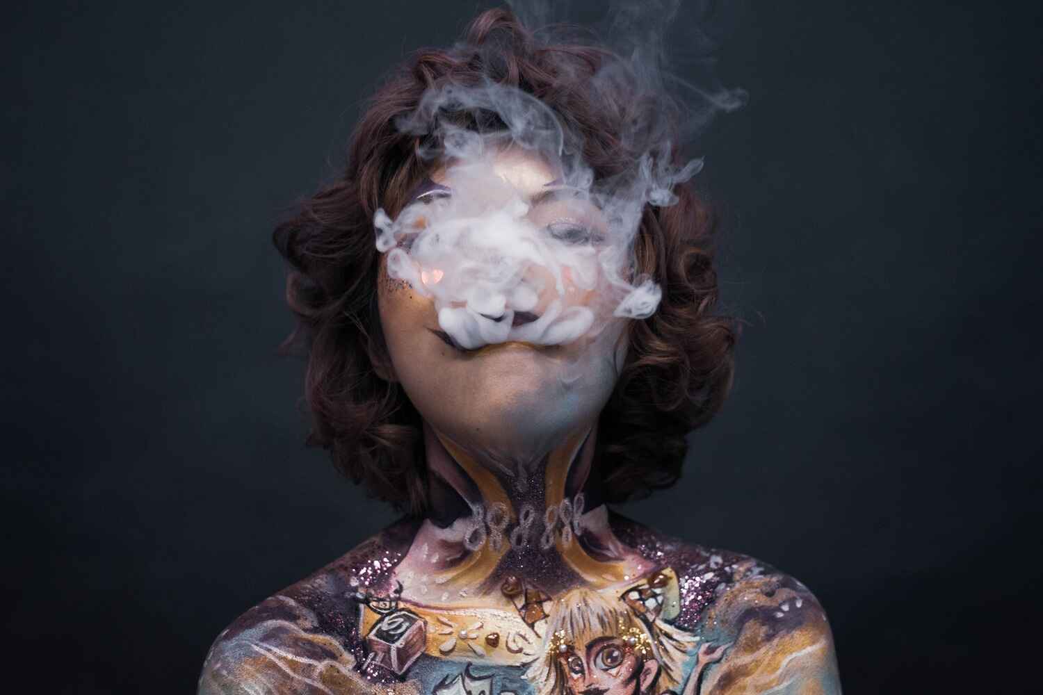 woman exhaling smoke