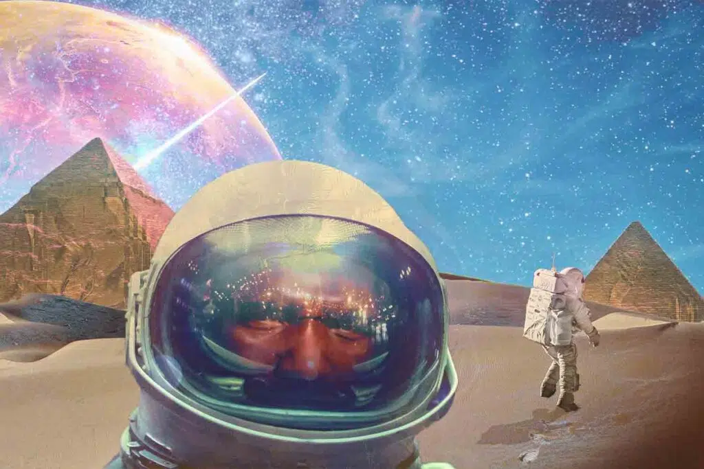 astronaut in desert with pyramids star studded sky and planet